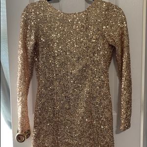 Open back gold mini dress